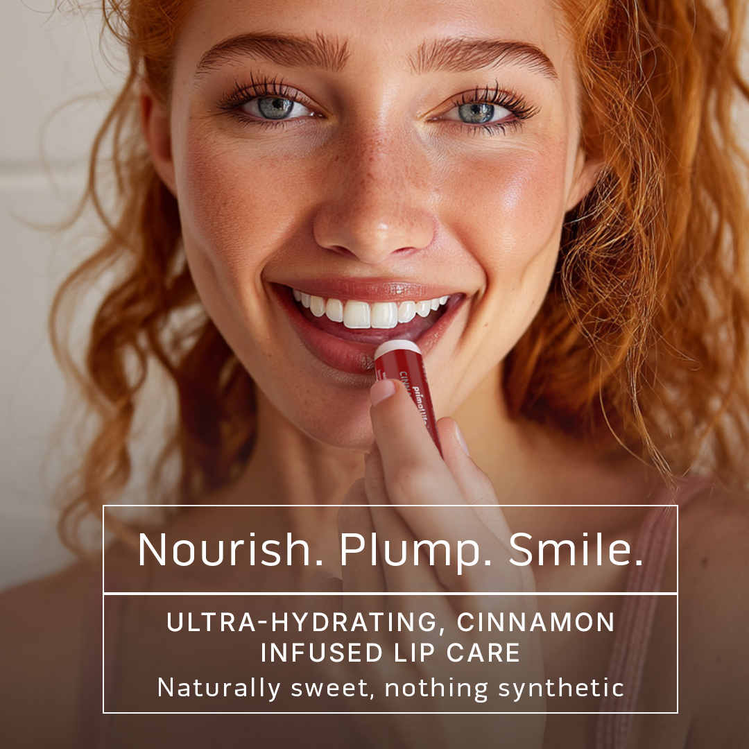 Woman applying cinnamon-infused lip care with text 'Nourish. Plump. Smile.'